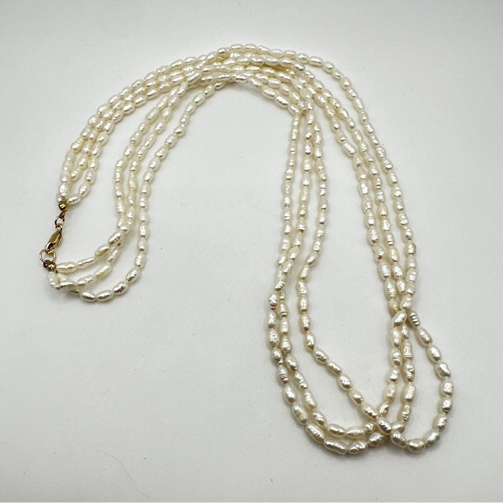 24" and three strands of rice pearls with 14kt yellow‎ gold hardware necklace!